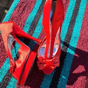 Red sling backs with bow.